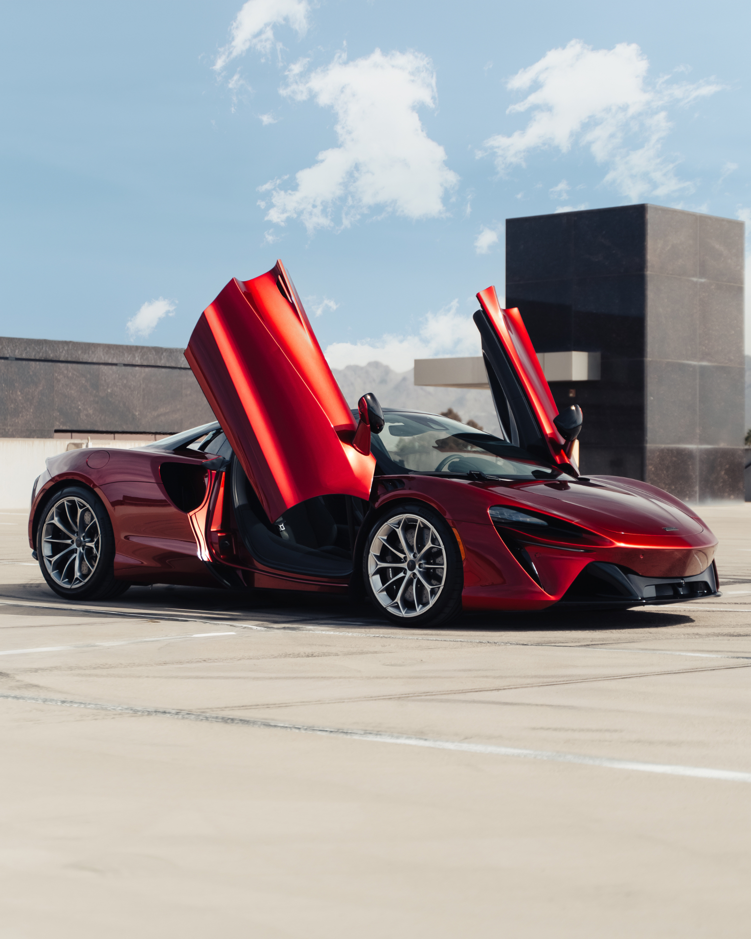 Red McLaren with raised doors in Scottsdale